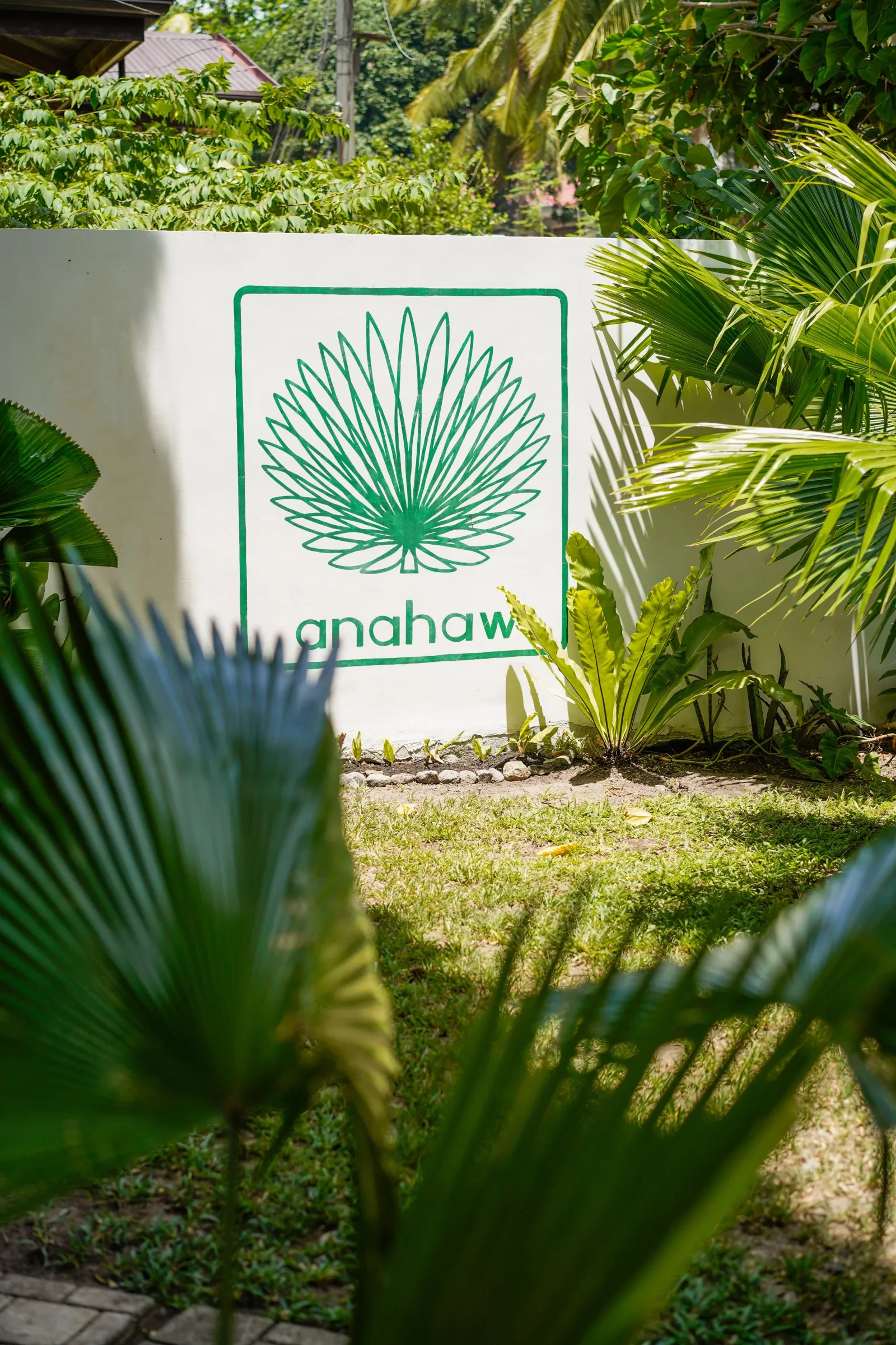 The Anahaw sign in the tropical garden at Anahaw Dauin