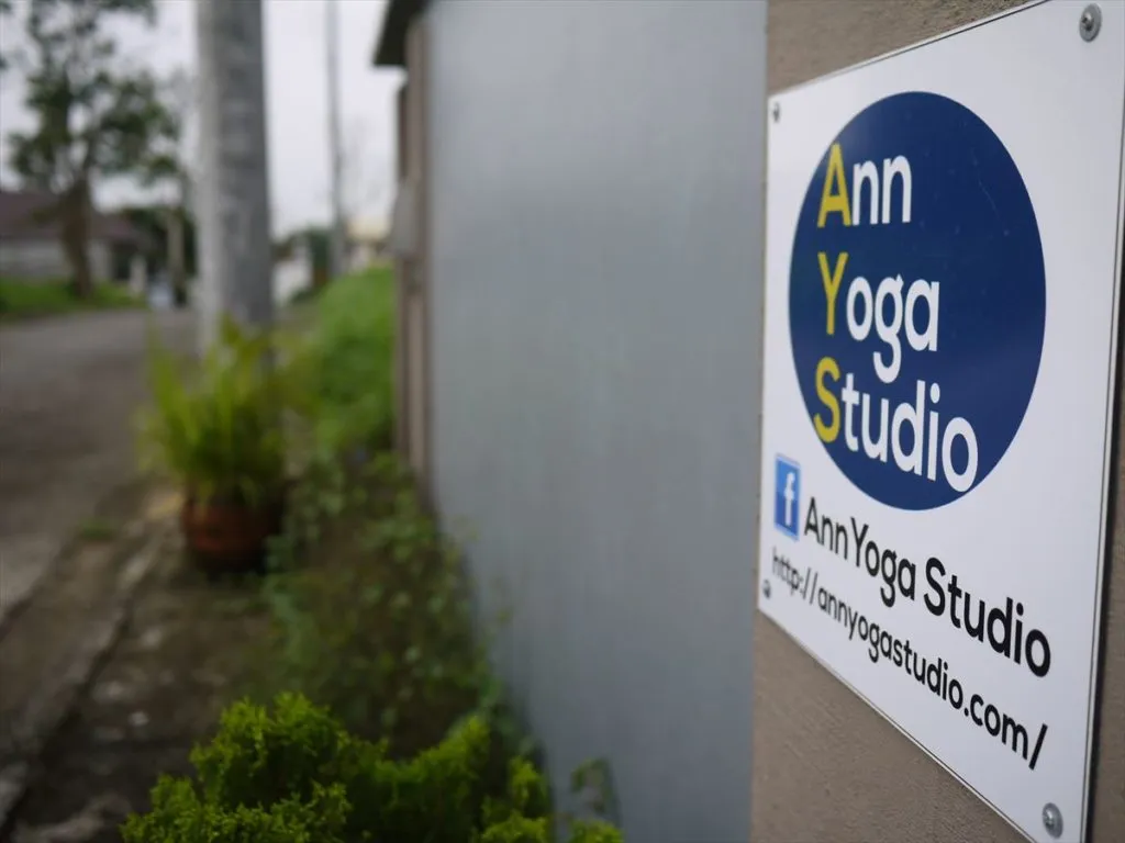 The Ann Yoga Studio sign on the outside wall