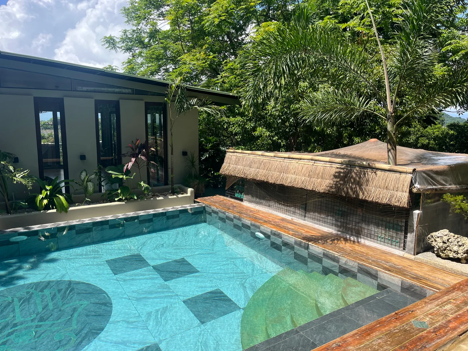 The plunge pool beside a villa at Calma Home Boracay
