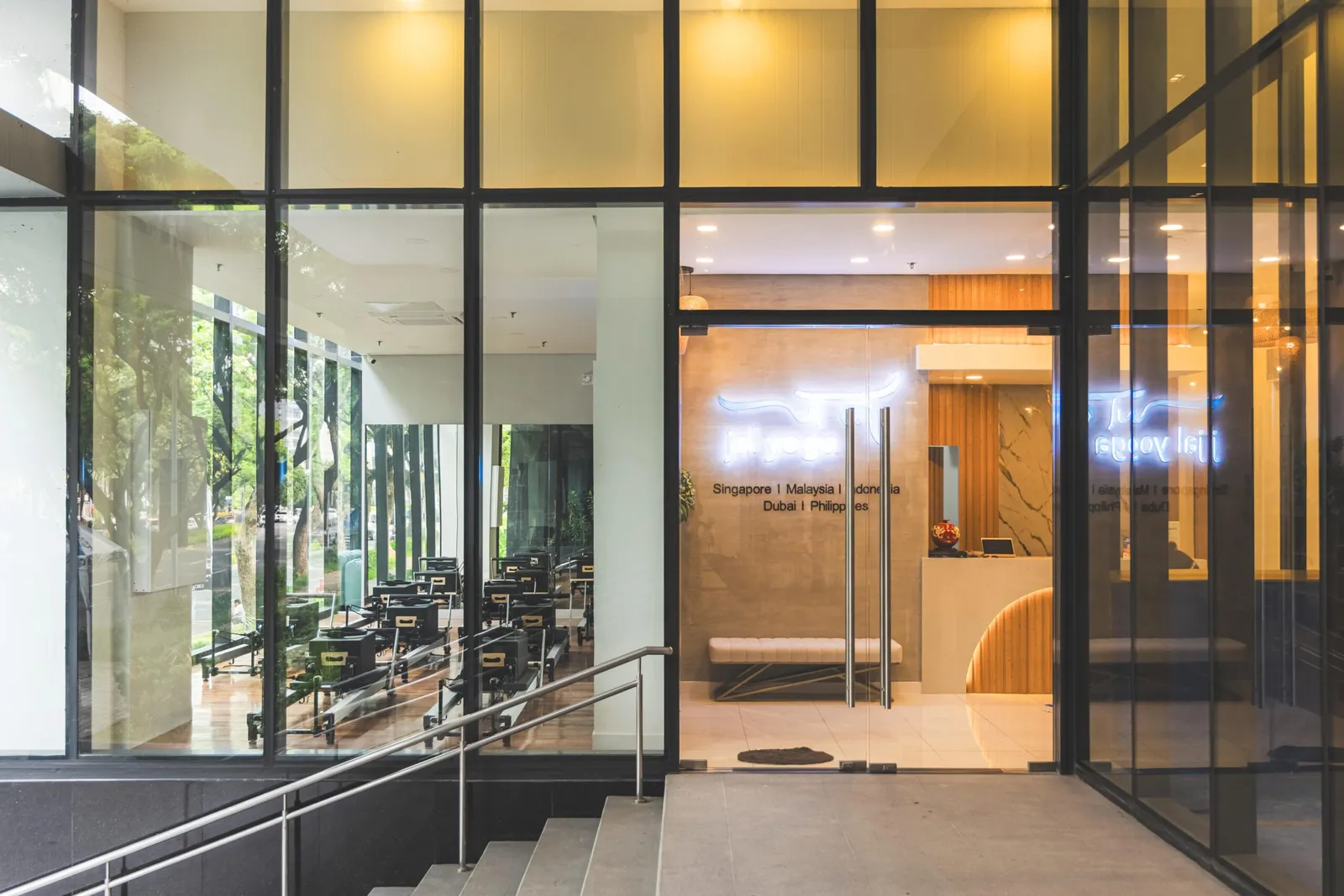The glass facade and entrance of a JAL Yoga studio